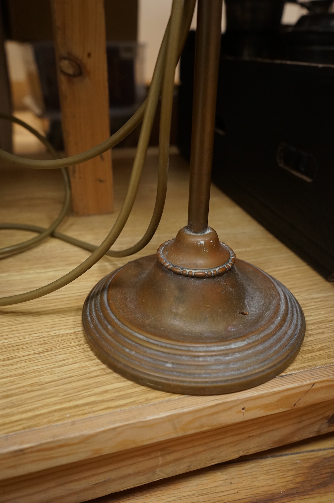 Two lamps comprising a 1960s Herdu ceramic lamp together with a brass and copper adjustable desk lamp, largest 56cm high